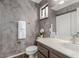 Stylish bathroom with faux-painted walls, bright vanity and decorative accents at 5905 Paseo Montana, Las Vegas, NV 89108
