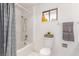 Clean and functional bathroom with a tub/shower combo, decorative accents, and ample lighting at 5905 Paseo Montana, Las Vegas, NV 89108