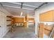 The interior of the garage has shelving, workbench and storage space, ready for your projects at 5905 Paseo Montana, Las Vegas, NV 89108
