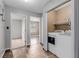 Laundry room featuring tile floors, washer, dryer and doorway to bedroom at 5905 Paseo Montana, Las Vegas, NV 89108