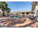 Beautiful pool area with lounge chair and palm trees offering an outdoor oasis at 5905 Paseo Montana, Las Vegas, NV 89108