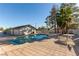 Backyard showcasing a refreshing in-ground pool and lounge area at 5905 Paseo Montana, Las Vegas, NV 89108