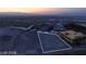 Expansive lot offers stunning views and building potential for a dream home in an exclusive community at 611 Grand Rim Dr, Henderson, NV 89012