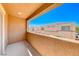 A relaxing outdoor balcony offers a tranquil view and an inviting space for fresh air at 6335 Pacific Sky St, North Las Vegas, NV 89081