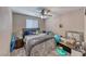 Cozy bedroom with ample space and a comfortable bed, perfect for relaxation at 6335 Pacific Sky St, North Las Vegas, NV 89081
