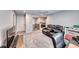 Bright and airy room with a comfortable seating area and a functional desk at 6335 Pacific Sky St, North Las Vegas, NV 89081