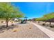 Charming community playground featuring play equipment and a brick pathway for Gathering fun at 6335 Pacific Sky St, North Las Vegas, NV 89081