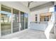 Exterior view of a balcony with ceiling fan and other buildings at 646 Spotted Falcon St, Las Vegas, NV 89138