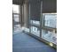 Bright bedroom with large windows and roller shades for privacy at 646 Spotted Falcon St, Las Vegas, NV 89138