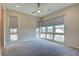 Spacious bedroom featuring multiple windows and carpet flooring at 646 Spotted Falcon St, Las Vegas, NV 89138
