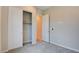 Bedroom with carpet, open closet, and doorway with contrasting flooring at 646 Spotted Falcon St, Las Vegas, NV 89138