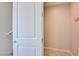 Interior shot of a hallway with hooks and wood-look flooring at 646 Spotted Falcon St, Las Vegas, NV 89138