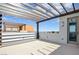 Modern outdoor patio with pergola and access to unit at 646 Spotted Falcon St, Las Vegas, NV 89138