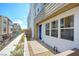 Attractive home exterior with landscaped side yard and modern design elements at 646 Spotted Falcon St, Las Vegas, NV 89138