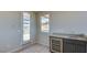 A convenient wet bar features a granite countertop and stainless steel cooler, perfect for entertaining at 646 Spotted Falcon St, Las Vegas, NV 89138