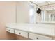 Bathroom vanity featuring ample counter space and convenient drawers for storage at 6513 Hyde Ave, Las Vegas, NV 89107