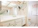 Bright bathroom featuring double sinks, ample counter space, and a well-lit vanity at 6513 Hyde Ave, Las Vegas, NV 89107