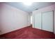 Bedroom featuring plush carpet and a large closet for storage at 6513 Hyde Ave, Las Vegas, NV 89107