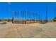 Well-maintained community baseball field with netting and stadium seating at 6656 Arctic Breeze St, North Las Vegas, NV 89084