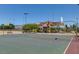 Community basketball court and playground with a shaded play structure and mountain views at 6656 Arctic Breeze St, North Las Vegas, NV 89084