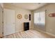 Neutral bedroom features plank flooring and a window at 6656 Arctic Breeze St, North Las Vegas, NV 89084