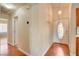Entryway with tile flooring and front door with decorative glass at 6656 Arctic Breeze St, North Las Vegas, NV 89084