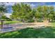 Community horseshoe pit with a view of trees, grass and a park at 6656 Arctic Breeze St, North Las Vegas, NV 89084