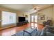 Spacious living room features a fireplace and sliding door access to the outside at 6656 Arctic Breeze St, North Las Vegas, NV 89084