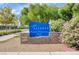 Entrance to Aliante Nature Discovery Park with sign, landscaping, and walking path at 6656 Arctic Breeze St, North Las Vegas, NV 89084