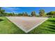 Volleyball court with net surrounded by grass and trees, perfect for community fun at 6656 Arctic Breeze St, North Las Vegas, NV 89084