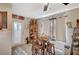 Charming dining area with a wooden table, decorative accents, and natural light at 700 Capri Dr # 27B, Boulder City, NV 89005