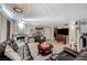 Open living space with a fireplace, wood floors, and a seamless layout at 700 Capri Dr # 27B, Boulder City, NV 89005