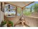 Relaxing outdoor patio space with unique architectural details and a water feature at 700 Capri Dr # 27B, Boulder City, NV 89005