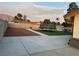 View of backyard with trampoline, patio and mountain view at 706 Red Lake Way, Las Vegas, NV 89110
