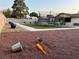 Large backyard with gravel, grass and covered trampoline at 706 Red Lake Way, Las Vegas, NV 89110