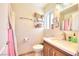 The bathroom features a single vanity with updated fixtures and a well-lit mirror at 706 Red Lake Way, Las Vegas, NV 89110