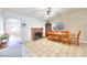 The dining room features a brick fireplace and open access to the kitchen and living areas at 706 Red Lake Way, Las Vegas, NV 89110