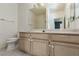 Bathroom featuring a spacious vanity area and large mirror at 7155 S Durango Dr # 303, Las Vegas, NV 89113