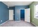 Spacious bedroom with ensuite bath and walk in closet with carpet at 7155 S Durango Dr # 303, Las Vegas, NV 89113