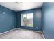 Cozy bedroom with a large window offering a view of the exterior at 7155 S Durango Dr # 303, Las Vegas, NV 89113