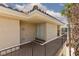 Exterior angle view of a condo featuring a private balcony, stucco walls, and red tile roofing, perfect for outdoor living at 7155 S Durango Dr # 303, Las Vegas, NV 89113