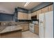 Functional kitchen featuring granite countertops, stainless steel appliances, and ample cabinet space for all your cooking needs at 7155 S Durango Dr # 303, Las Vegas, NV 89113