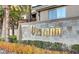 Vistaña community signage with stone accents and lush landscaping, showing community identity at 7155 S Durango Dr # 303, Las Vegas, NV 89113