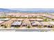 Neighborhood aerial shot showcasing well-manicured lawns, diverse homes, and convenient street access at 717 Monroe Hill Pl, Henderson, NV 89011