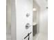 Modern shower with sleek fixtures, white tile, and glass door at 717 Monroe Hill Pl, Henderson, NV 89011