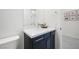 Bathroom featuring modern vanity with a white countertop, a mirror, a toilet, and tiled flooring at 717 Monroe Hill Pl, Henderson, NV 89011
