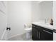 Bathroom featuring modern vanity with a white countertop, a mirror, a toilet, and tiled flooring at 717 Monroe Hill Pl, Henderson, NV 89011