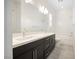 Stylish bathroom features double sinks, modern lighting, and separate tub at 717 Monroe Hill Pl, Henderson, NV 89011