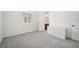 Bright bedroom features soft carpet, natural light and a cabinet with drawers at 717 Monroe Hill Pl, Henderson, NV 89011
