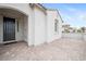 Inviting front door with modern design, set within a cozy, paved patio entrance at 717 Monroe Hill Pl, Henderson, NV 89011